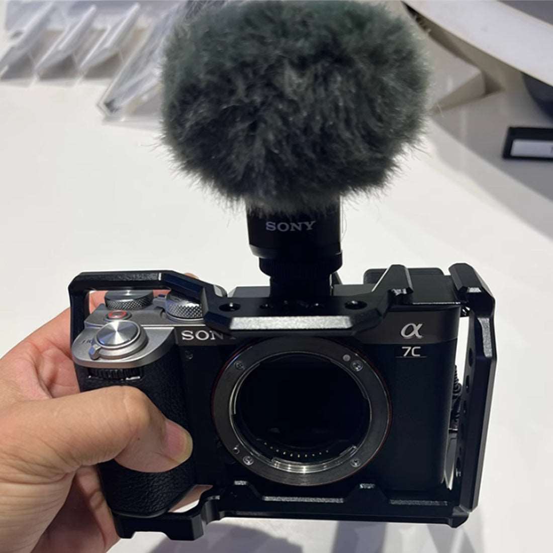 Topcine A7C Cage for Sony Alpha 7C /Alpha 7C R /Alpha 7C II Camera,Quick Release Plate for Arca-Swiss,1/4" & 3/8" Screw Holes and Cold Shoe Mount for Accessories  TOPCINE